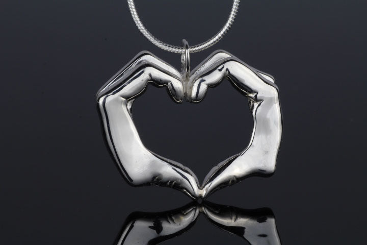 Sterling silver friendship heart shaped hands pendant