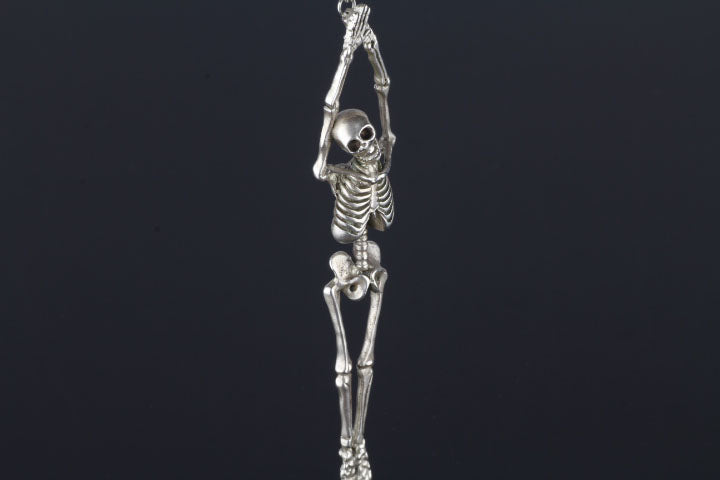 Handmade sterling silver anatomical skeleton pendant